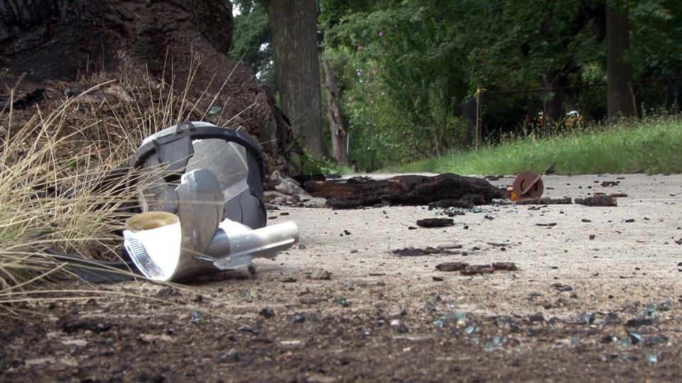 Scattered car parts left behind after fatal car crash in Long Branch
