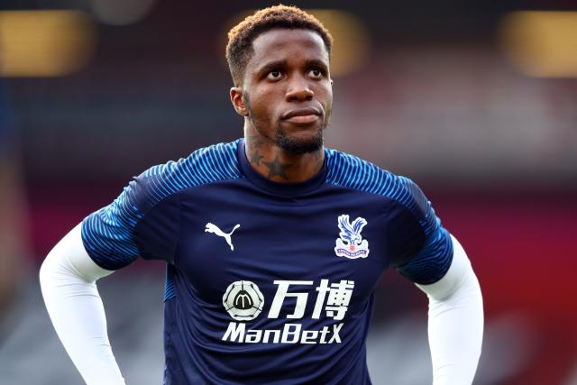 Wilfried Zaha received racist messages on Instagram, and the police have arrested a 12-year-old boy who may be responsible. (Photo by MICHAEL STEELE/POOL/AFP via Getty Images)