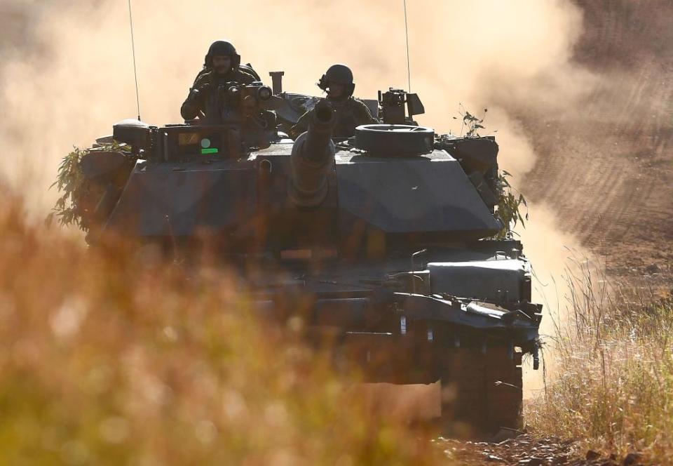 An Australian M1 Abrams tank moves along a dirt road during the Brolga Strike exercise in Townsville, Australia, on June 16, 2017. (Ian Hitchcock)