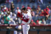 Los Angeles Angels starting pitcher Shohei Ohtani, of Japan, adjusts his hat after giving up a home run against Oakland Athletics' Yan Gomes, not pictured, during the third inning of a baseball game Sunday, Sept. 19, 2021, in Anaheim, Calif. (AP Photo/Jae C. Hong)