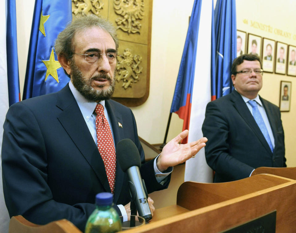 Iraqi Defence Minister Sadun al-Dulaymi, left, and his Czech counterpart Alexandr Vondra, right, attend a news conference after their talks in Prague Friday, Oct. 12, 2012. Iraq will buy 28 Czech-made L-159 fighter jets for about one billion US$, they announced. (AP Photo/CTK, Stanislav Zbynek) SLOVAKIA OUT