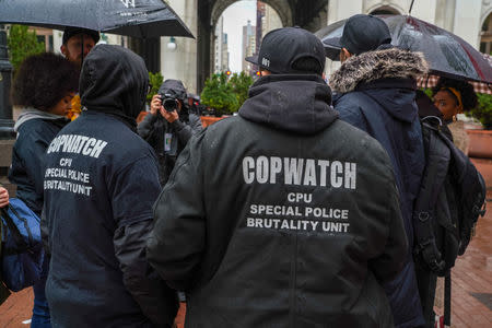 Cop Watch Patrol Unit arrives for the disciplinary trial of police officer Daniel Pantaleo in relation to the death of Eric Garner at 1 Police Plaza in the Manhattan borough of New York, New York, U.S., May 13, 2019. REUTERS/David 'Dee' Delgado