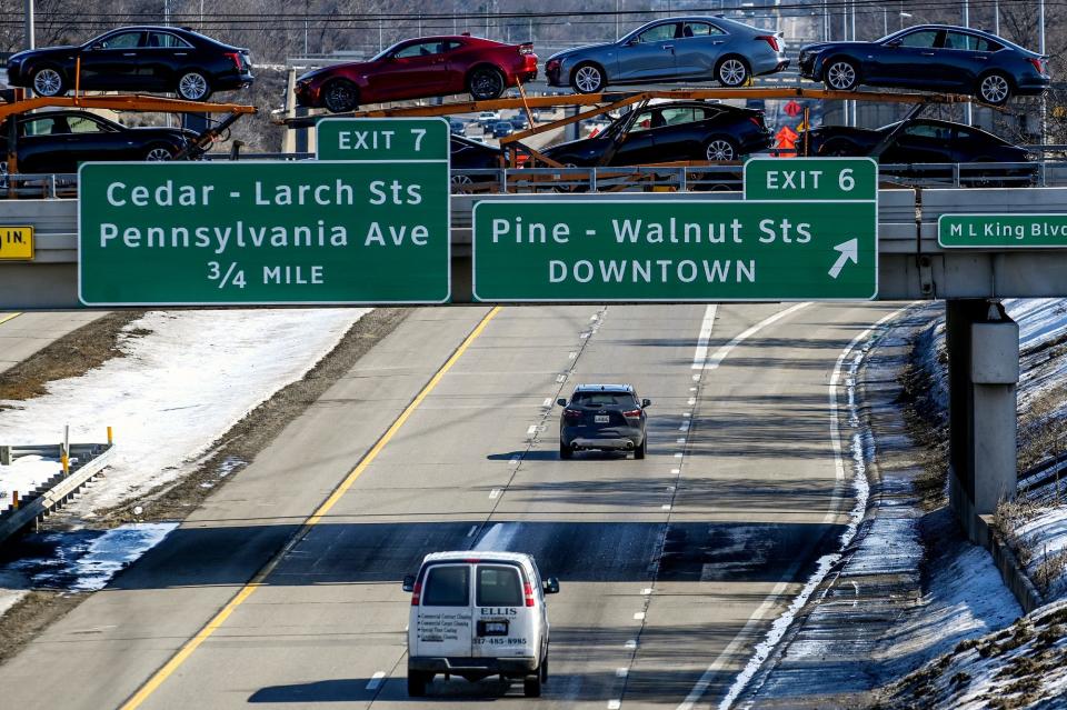 Traffic moves along eastbound I-496 near the Pine and Walnut streets exit on Thursday, Feb. 25, 2021, in Lansing. A two-mile stretch of the freeway in Lansing will be closed this summer for an $82-million rebuilding project.