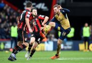 Football Soccer - AFC Bournemouth v Arsenal - Barclays Premier League - Vitality Stadium - 7/2/16, Arsenal's Aaron Ramsey in action with Bournemouth's Harry Arter Reuters / Dylan Martinez/ Livepic