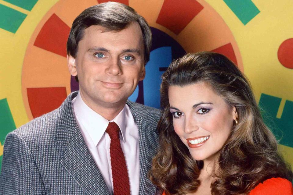 <p>Herb Ball/NBCU Photo Bank/Getty</p> Pat Sajak and Vanna White