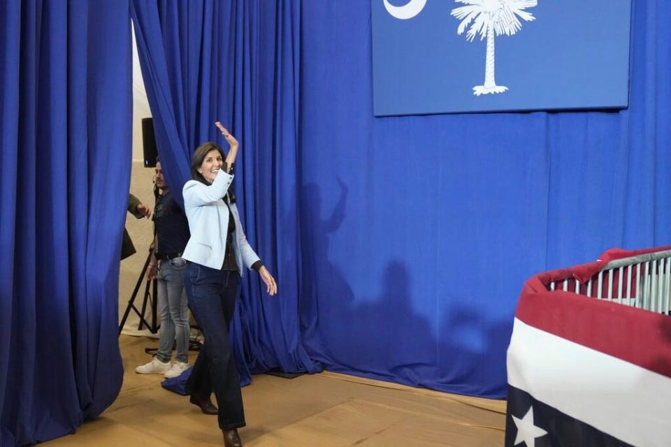 GOP presidential hopeful Nikki Haley waves as she enters a campaign event on Monday, Nov. 27, 2023, in Bluffton, S.C. Haley is among a cluster of Republican candidates competing for second place in a GOP Republican primary thus far largely dominated by former President Donald Trump. (AP Photo/Meg Kinnard) ORG XMIT: SCMK104