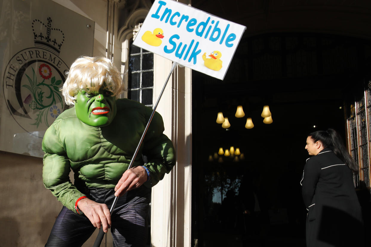 A protestor dressed as a cross between Boris Johnson and the Incredible Hulk outside the Supreme Court