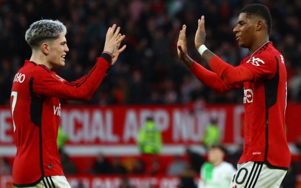 Alejandro Garnacho and Marcus Rashford do high fives