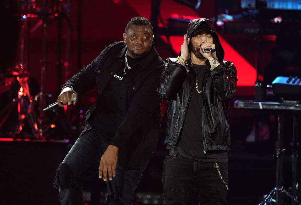 Inductee Eminem, right, performs with Mr. Porter during the Rock & Roll Hall of Fame Induction Ceremony on Saturday, Nov. 5, 2022, at the Microsoft Theater in Los Angeles. (AP Photo/Chris Pizzello)