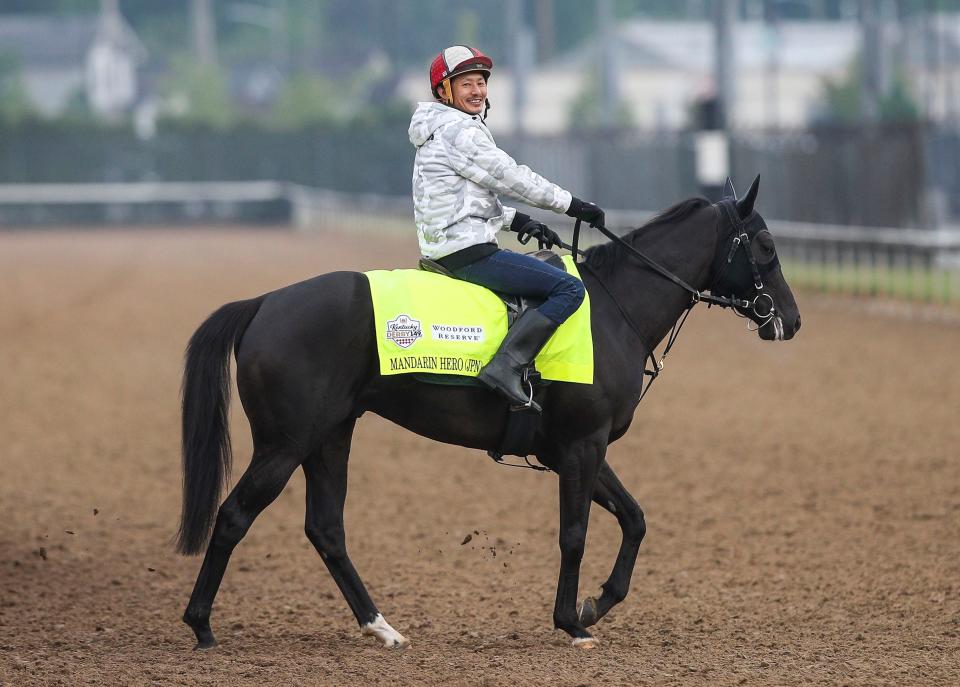 Rider Yuji Horita smiles aboard Kentucky Derby contender Mandarin Hero at Churchill Downs Saturday, April 29, 2023, in Louisville, Ky. The Japanese horse is trained by Terunobu Fujita.