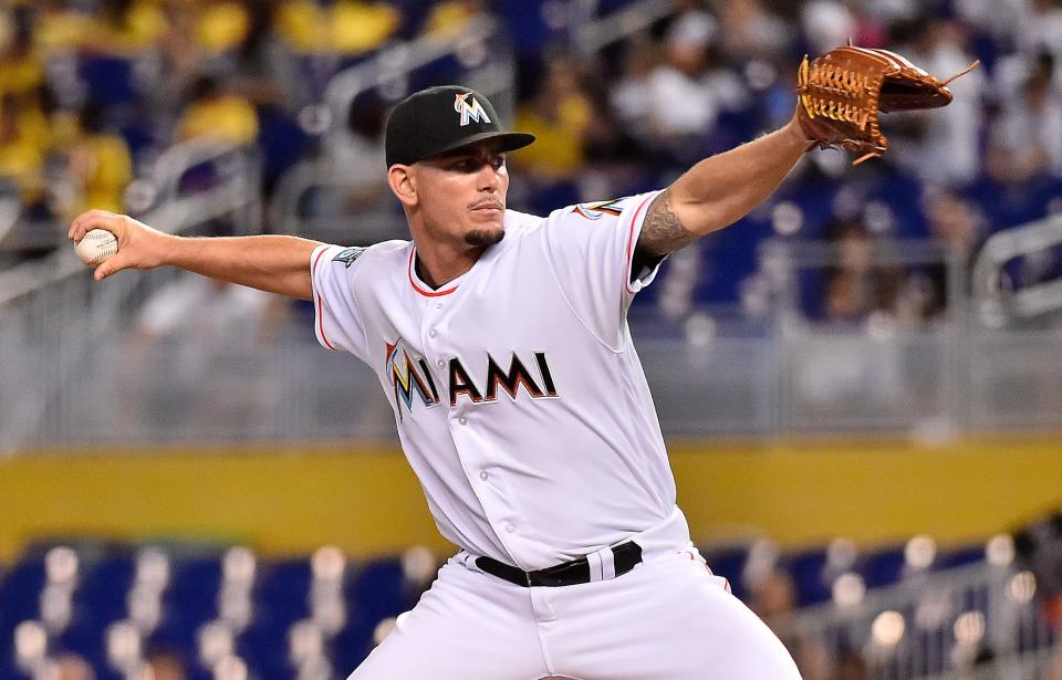 Miami Marlins relief pitcher Nick Wittgren (64) delivers a pitch in the fifth inning against the Arizona Diamondbacks at Marlins Park on June 28, 2018.