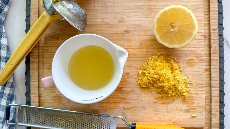 lemon juice and zest on cutting board