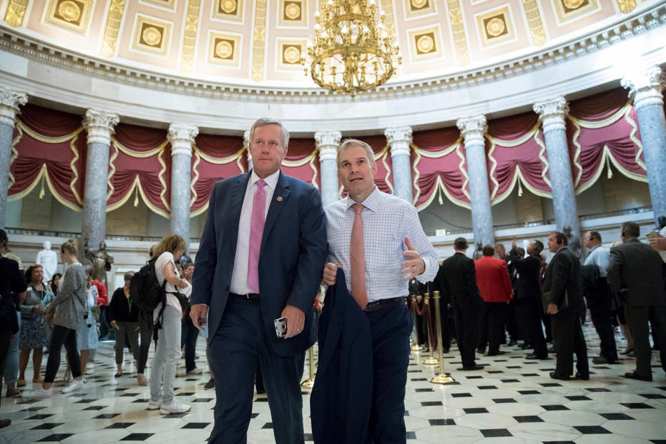 Rep. Mark Meadows, R-N.C., and Rep. Jim Jordan, R-Ohio, walk through Statuary Hall at the Capitol. (J. Scott Applewhite / AP file)