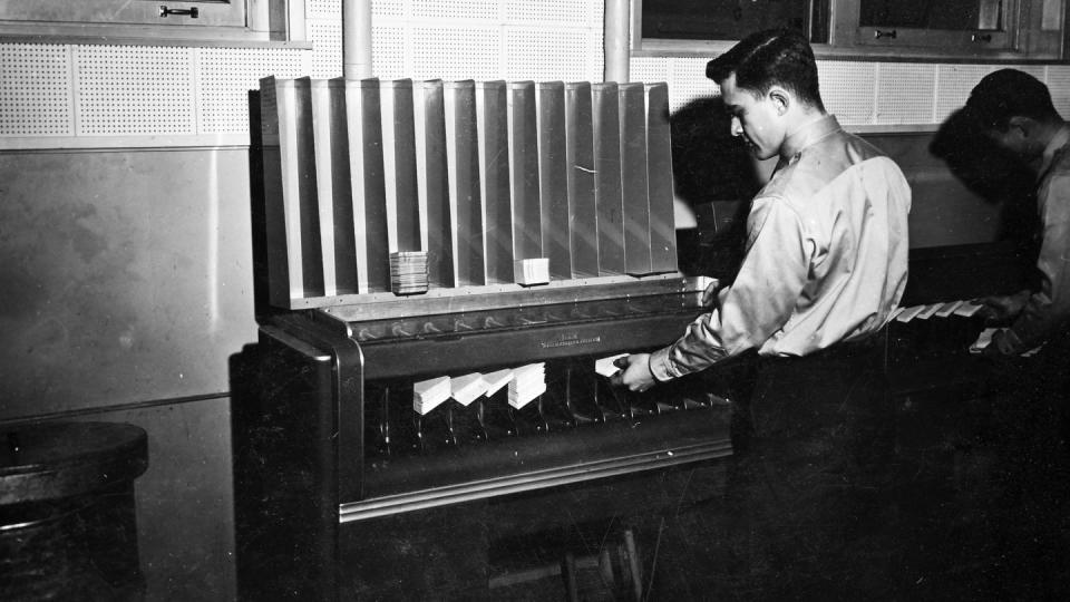 Pfc. Richard A. Jenke operating an IBM punch card sorter in building 977 at Fort Richardson, Alaska, on Nov. 9, 1959. (Spc. Brian Willhite/Army)