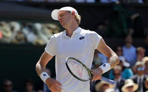 South Africa's Kevin Anderson is dejected after losing a point during the men's singles final match against Novak Djokovic of Serbia at the Wimbledon Tennis Championships in London, Sunday July 15, 2018. - Credit: AP