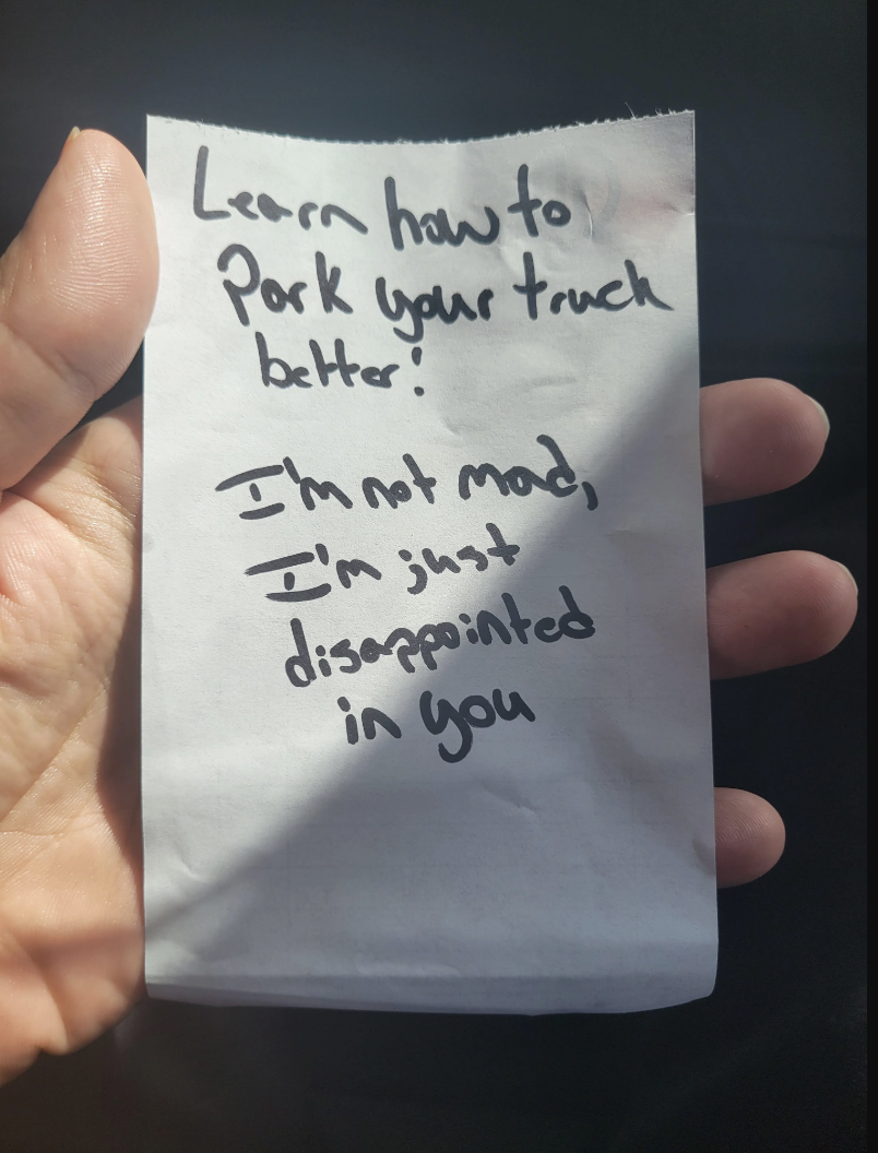 The note says "learn how to park your truck better; I'm not mad, just disappointed in you"