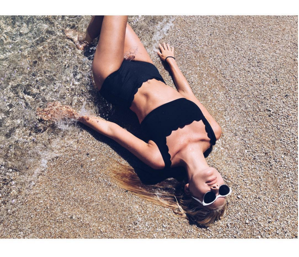 <p>The model donned a scalloped high-waisted bikini with bralet top by Marysia Swim during a recent trip to Mykonos. <i>[Photo: Instagram/Elsa Hosk]</i></p>