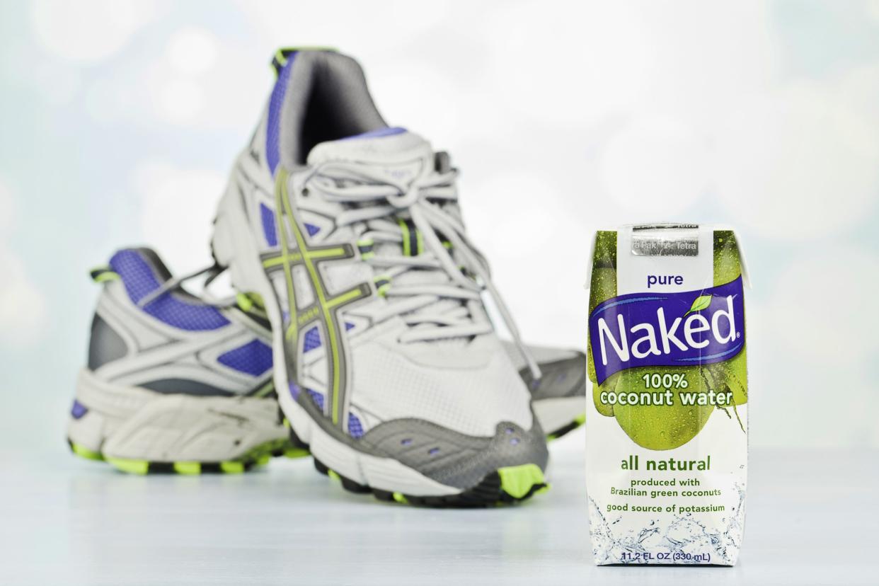 sports shoes and coconut water