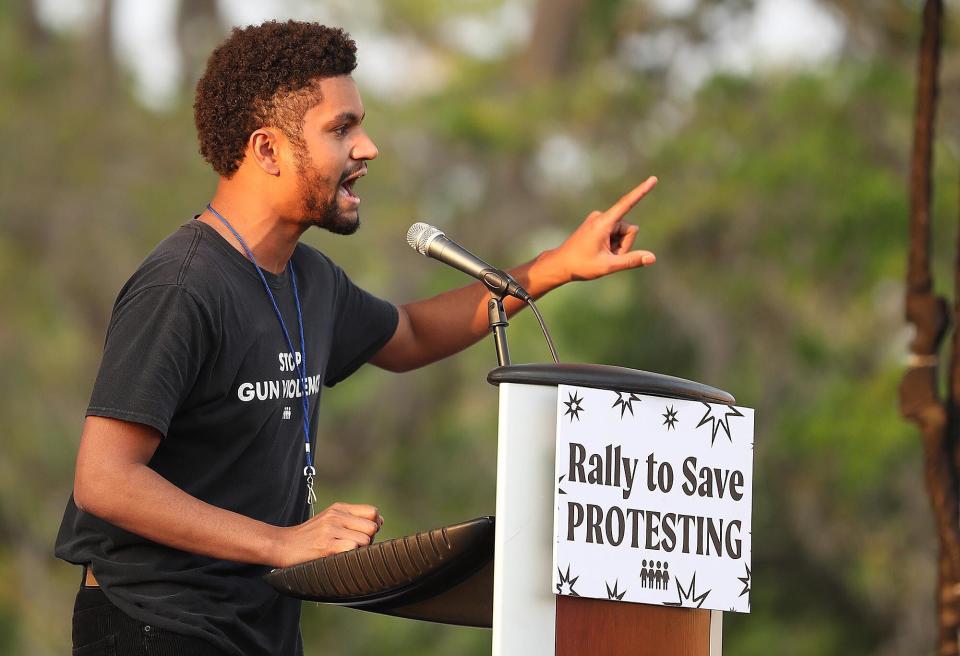 Maxwell Frost, National Organizing Director for March For Our Lives, speaks during a March For Our Lives Florida drive-in rally and aid event at Tinker Field in Orlando on Friday, March 26, 2021.