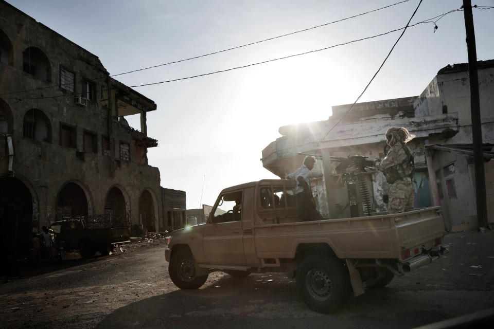 Saudi-led coalition backed forces patrol Mocha, Yemen, Feb. 12, 2018. (AP Photo/Nariman El-Mofty)