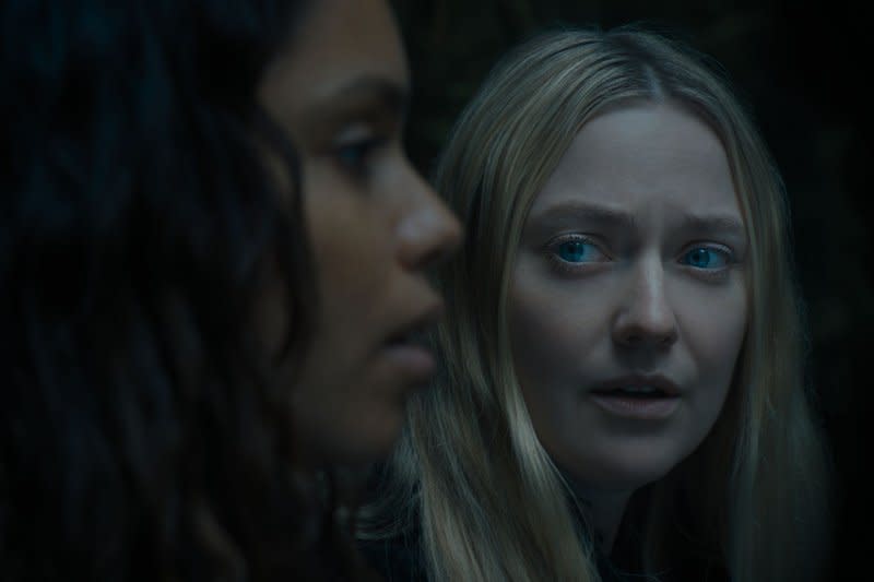 Dakota Fanning (R) and Georgina Campbell star in "The Watchers." Photo courtesy of Warner Bros. Pictures