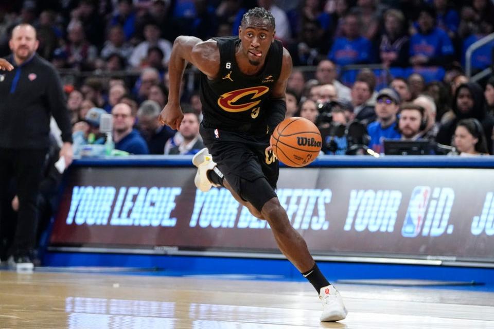 Cleveland Cavaliers' Caris LeVert looks to pass the ball during Game 3 in the NBA basketball first-round playoff series against the New York Knicks on Friday, April 21, 2023, in New York.