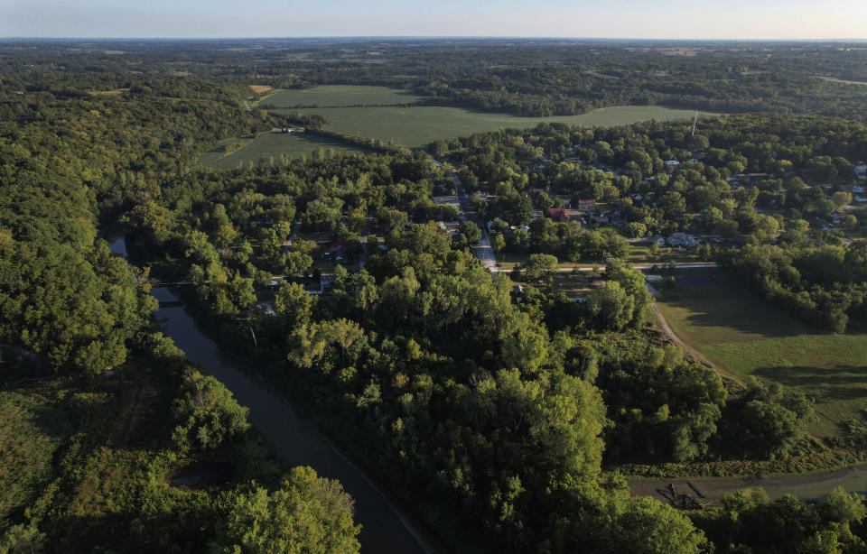 An aerial view of the small town of Rocheport, Mo., Saturday, Sept. 9, 2023. Mike Dulak, who grew up Catholic in Southern California, said, "Most religions are there to control people and get money from them." Dulak, now 76, living in Rocheport, also cited sex abuse scandals in Catholic and Southern Baptist churches. "I can't buy into that," he said. (AP Photo/Jessie Wardarski)