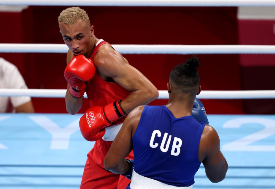 Whittaker exchanges punches with Cuban Lopez (Getty)