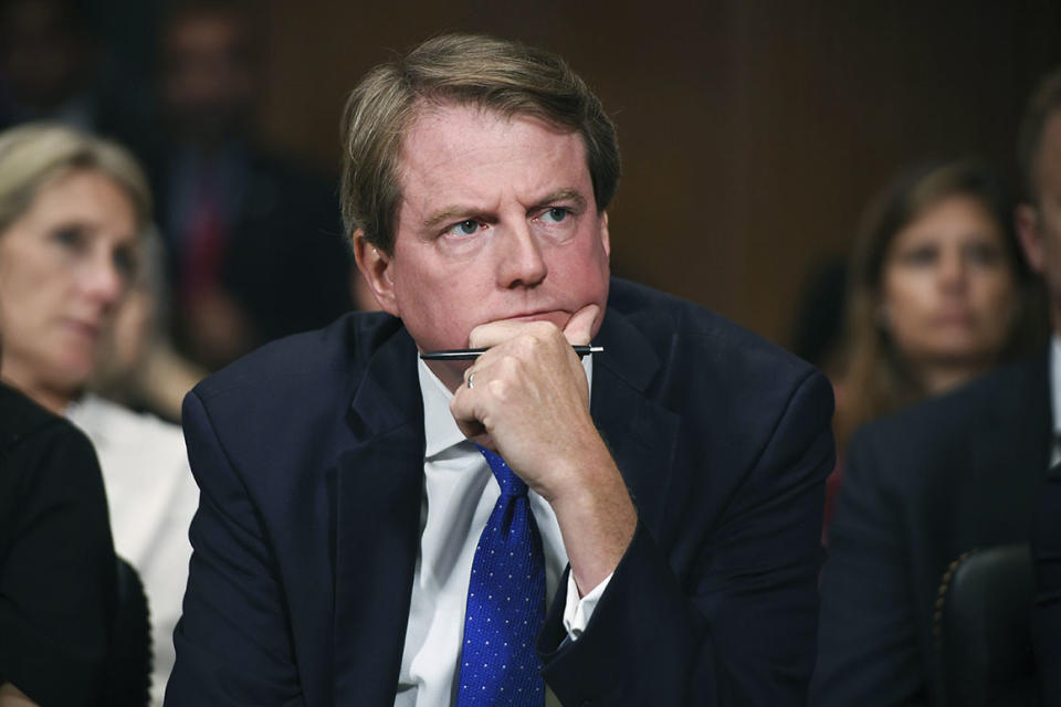 Don McGahn listens as Supreme court nominee Brett Kavanaugh testifies before the Senate Judiciary Committee.