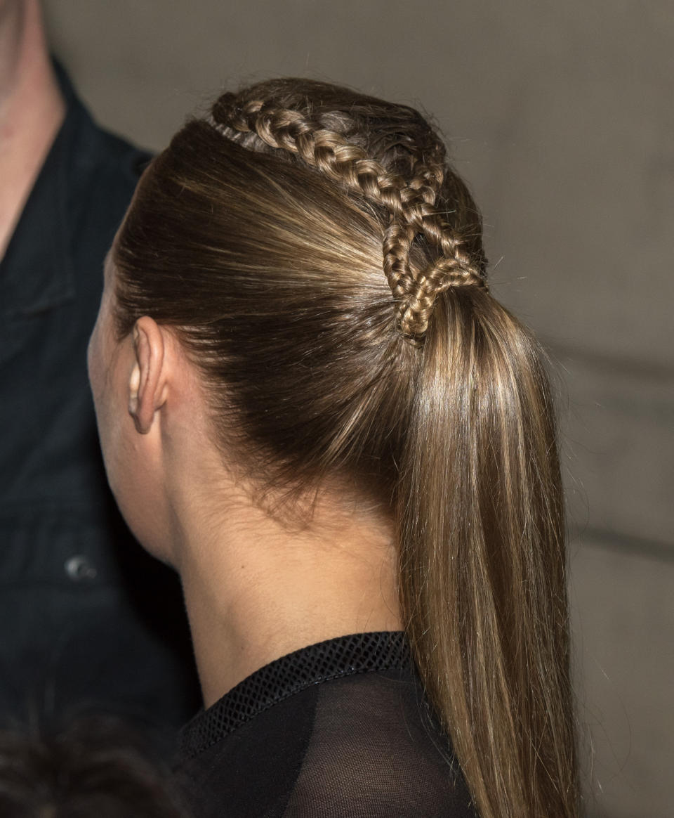 Ronda Rousey </br> <em>Here's another stunning example that incorporates French braids and a ponytail. This sleek look can easily transition from day to night. </em>