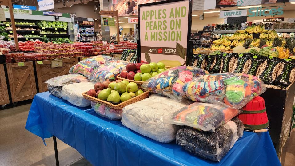 The display for Apples and Pears on a Mission, a campaign to raise money for socks for the homeless at the United Supermarkets on Soncy Road.