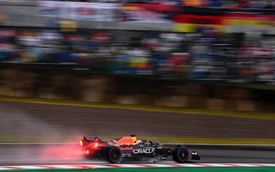 Max Verstappen driving the Oracle Red Bull Racing RB18 on track during the F1 Grand Prix of Japan - Clive Mason 