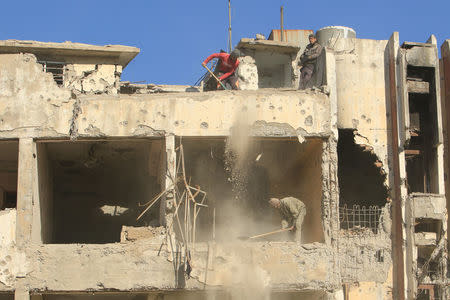 A destroyed building from previous clashes is seen in Mosul, Iraq January 10, 2018. Picture taken January 10, 2018. To match Special Report IRAQ-MOSUL/OFFICIAL REUTERS/Ari Jalal