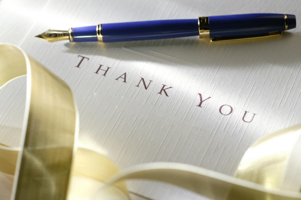 A thank-you note with a fountain pen