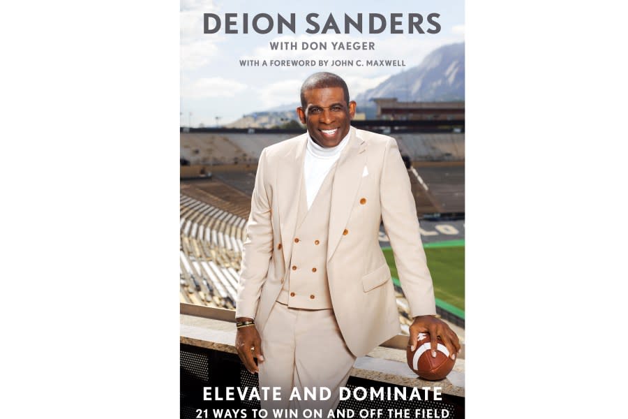 This cover image released by 13a, an imprint of Gallery Books, shows "Elevate and Dominate: 21 Ways to Win On and Off the Field" by Deion Sanders. The book will publish on March 12. (13a via AP)