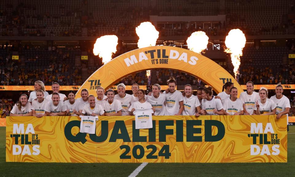 <span>The Matildas celebrate after securing their qualification for the Paris 2024 Olympics after beating Uzbekistan at Marvel Stadium.</span><span>Photograph: Darrian Traynor/Getty Images</span>