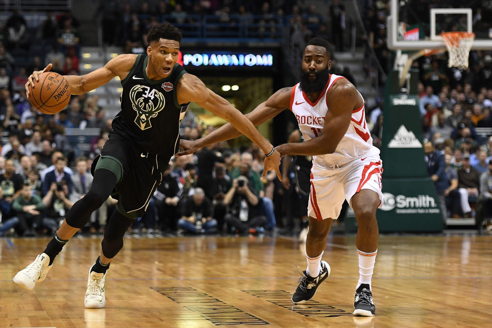 Giannis Antetokounmpo and James Harden finished 1-2 in last year's MVP race. (Stacy Revere/Getty Images)