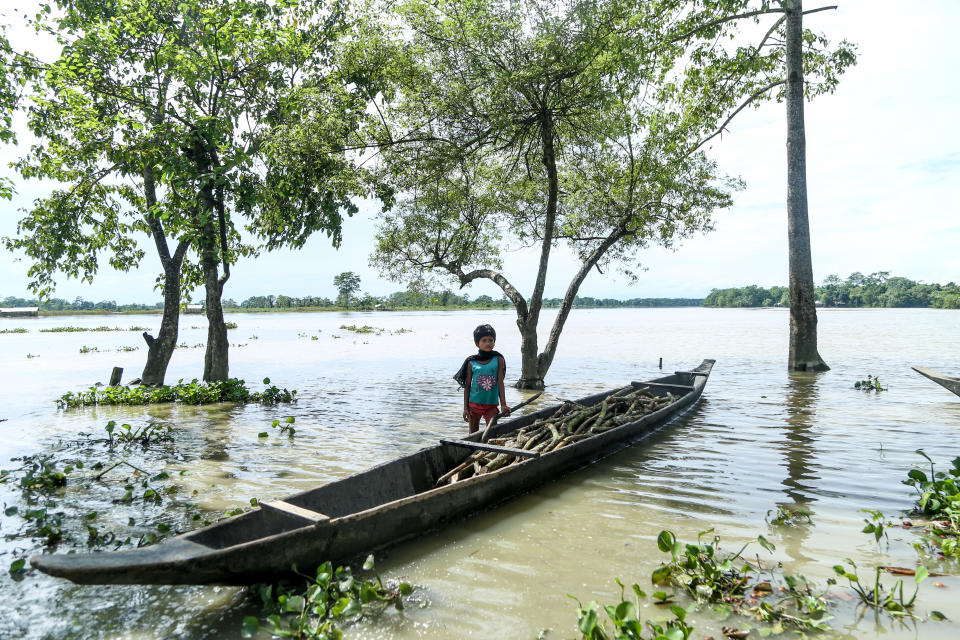 People Affected By Flood In Assam