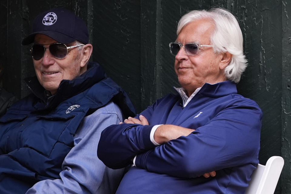 Horse trainers D. Wayne Lukas, left, and Bob Baffert talk ahead of the 149th running of the Preakness Stakes horse race at Pimlico Race Course, Friday, May 17, 2024, in Baltimore. (AP Photo/Julia Nikhinson)