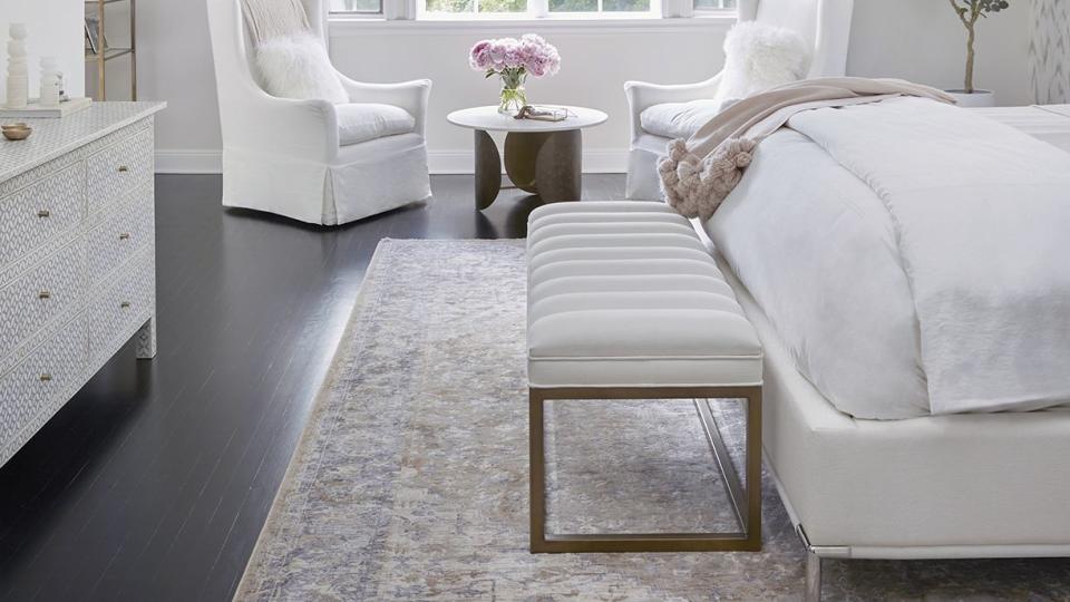 white curtains white bedding in bright bedroom