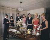 <p>For smaller groups, you couldn't go wrong with a buffet. Set up around the dining room table, everything could be laid out at once, from the hors d'oeuvres to dessert. </p>