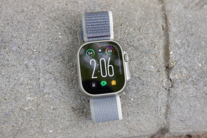 The Apple Watch Ultra 2 laying on the ground, showing the Modular Ultra watch face.