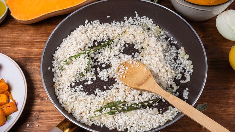 Toasting risotto rice in pan