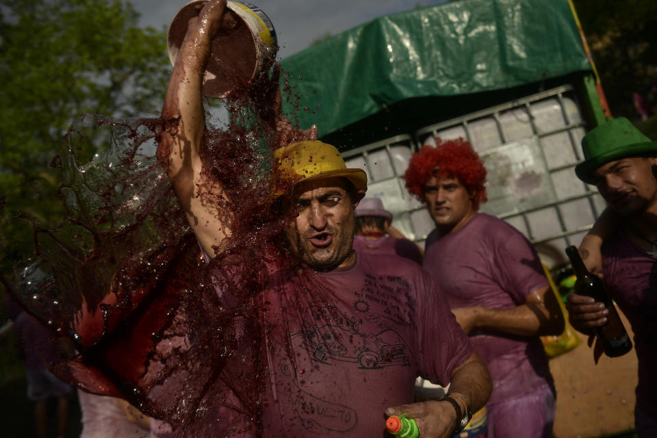 <p>People take part in a wine battle, in the small village of Haro, northern Spain, Friday, June 29, 2018. (Photo: Alvaro Barrientos/AP) </p>