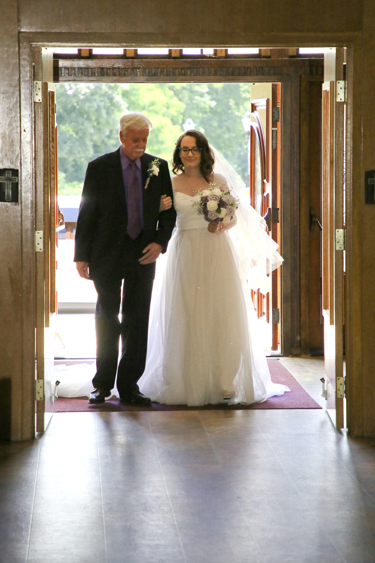 The author on her wedding day with her father. (Courtesy Chrissy Callahan
)