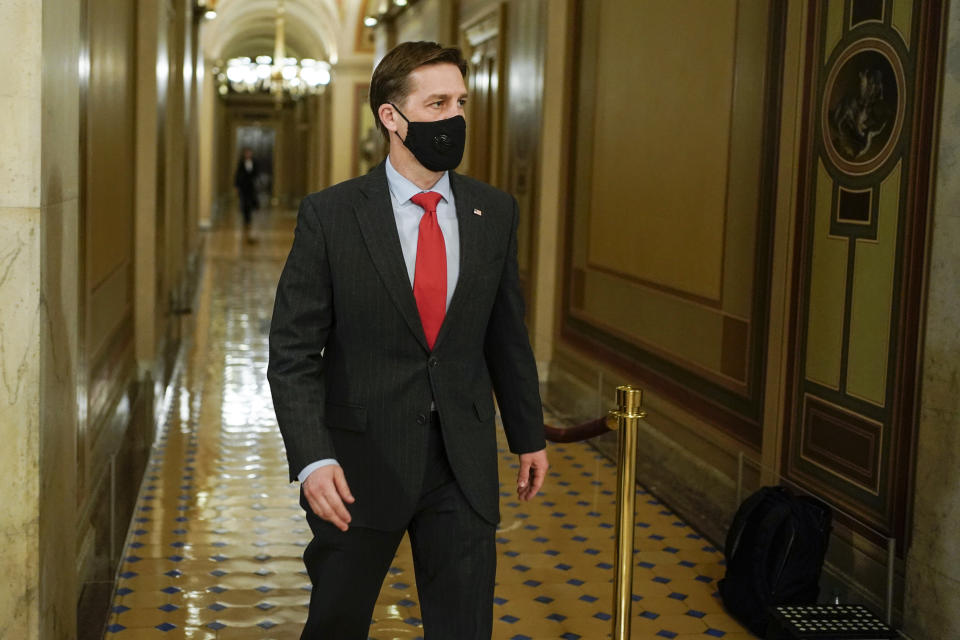 Sen. Ben Sasse, R-Neb., walks during a break in the second impeachment trial of former President Donald Trump, at the Capitol, Wednesday, Feb. 10, 2021 in Washington. (Joshua Roberts/Pool via AP)