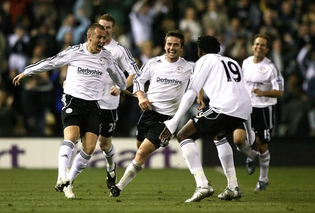 Kenny Miller, left, celebrates his winner against Newcastle