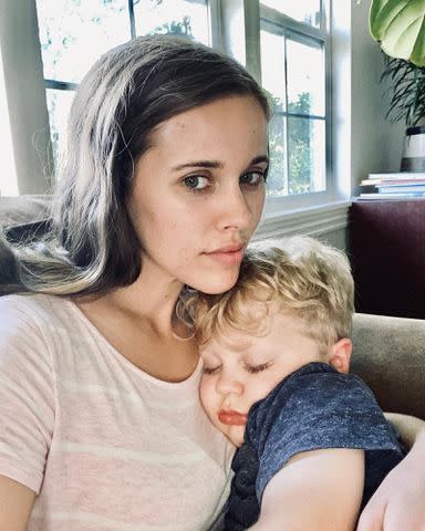 <p>Jessa Seewald Instagram</p> Jessa Seewald holding her son Henry Wilberforce Seewald as he sleeps