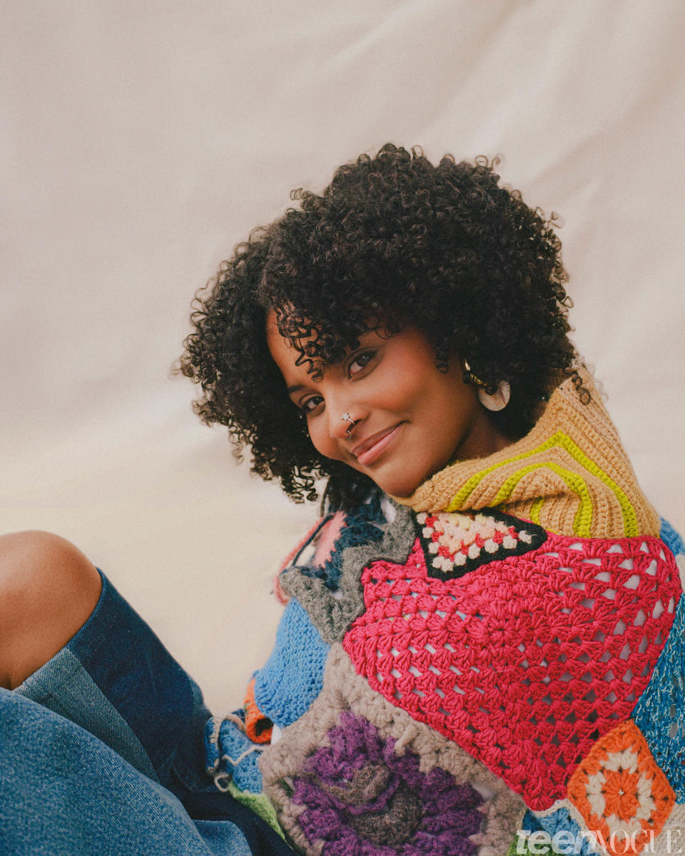 Mari Copeny in an Isaboko sweater, Coachtopia shorts, Ganni boots, Susana Vega ear cuff, SVNR earrings, Bondeye ring, Mejuri ring.