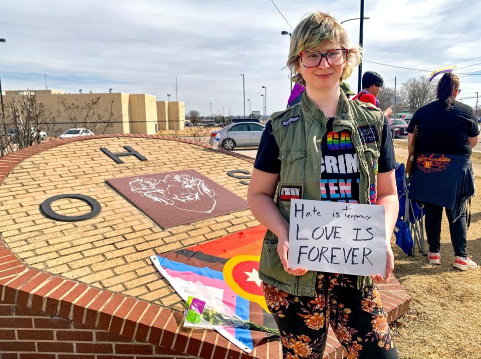 Max, 28 of Tulsa, attends a rally Monday outside Owasso High School. Rolseth, who is nonbinary and whose pronouns are they and them, graduated from Owasso High School in 2013.